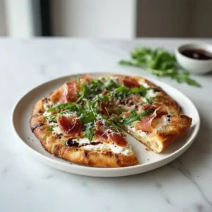 Crispy Prosciutto and Ricotta Flatbread with Fig Jam and Arugula